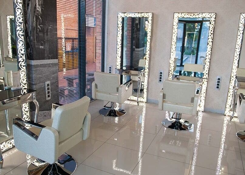 Chic interior of Veaudry International JOHANNESBURG showing styling chairs and mirrors in Johannesburg, Gauteng, ZA.