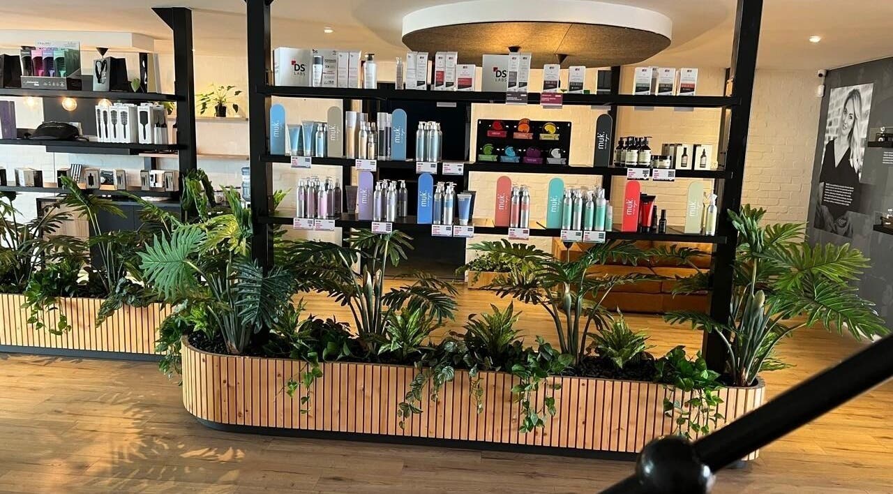 Stylish product display at Veaudry International CAPE TOWN, Cape Town, Western Cape, ZA, with lush greenery.