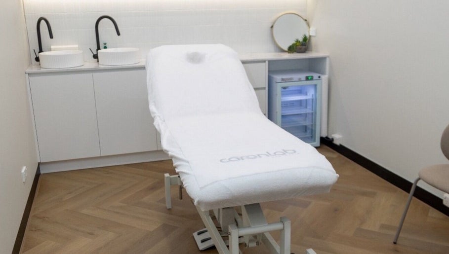 Calm treatment room at Aesthetics By Wendy, Brunswick East, Victoria, AU, featuring a modern spa bed.