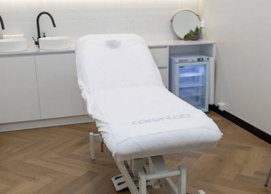 Calm treatment room at Aesthetics By Wendy, Brunswick East, Victoria, AU, featuring a modern spa bed.