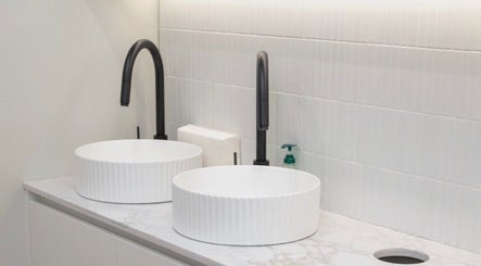 Modern twin sinks at Aesthetics By Wendy, showcasing luxury design in Brunswick East, Victoria, AU.