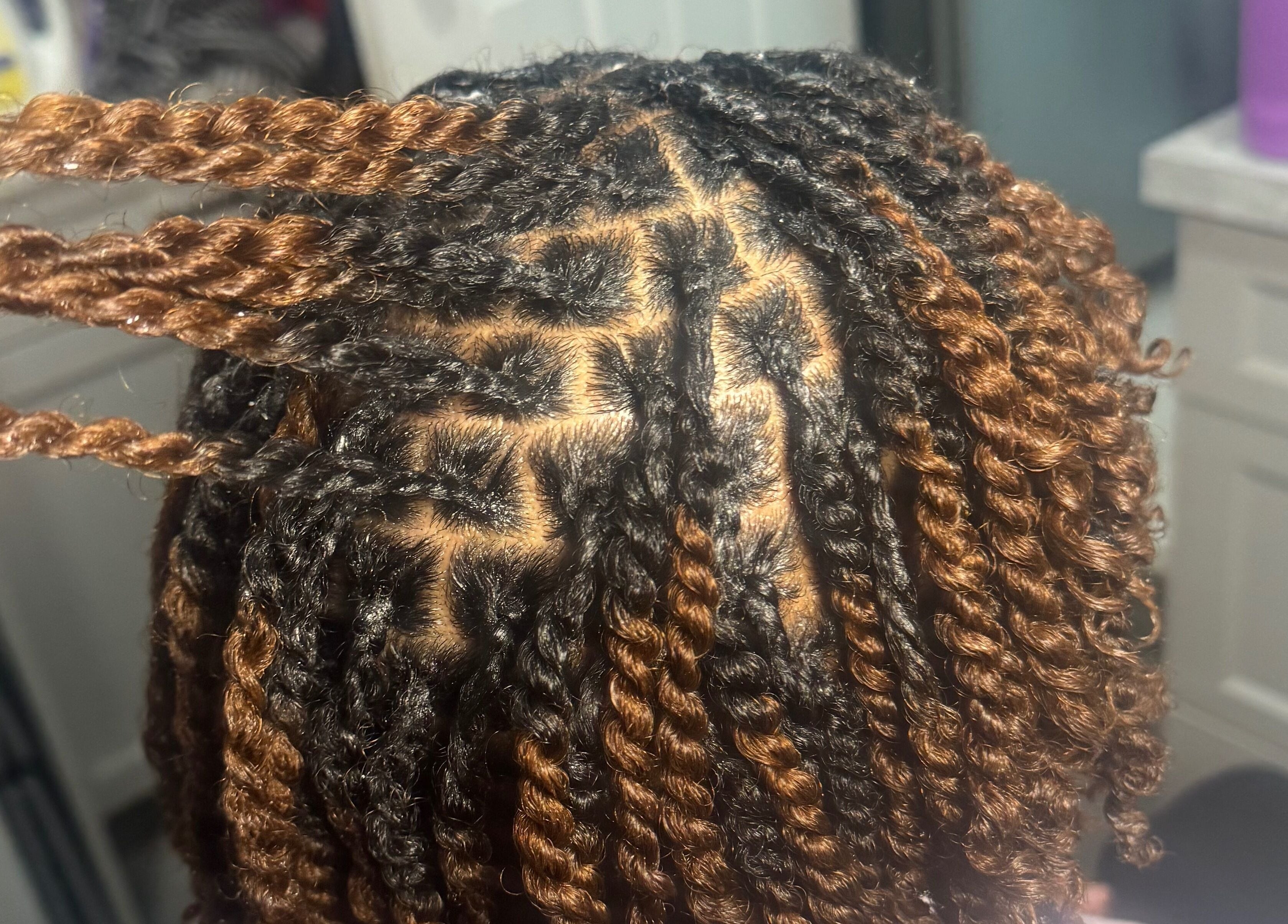 Close-up of styled twisted braids at Bibii Hair, Miramar, Florida, US.