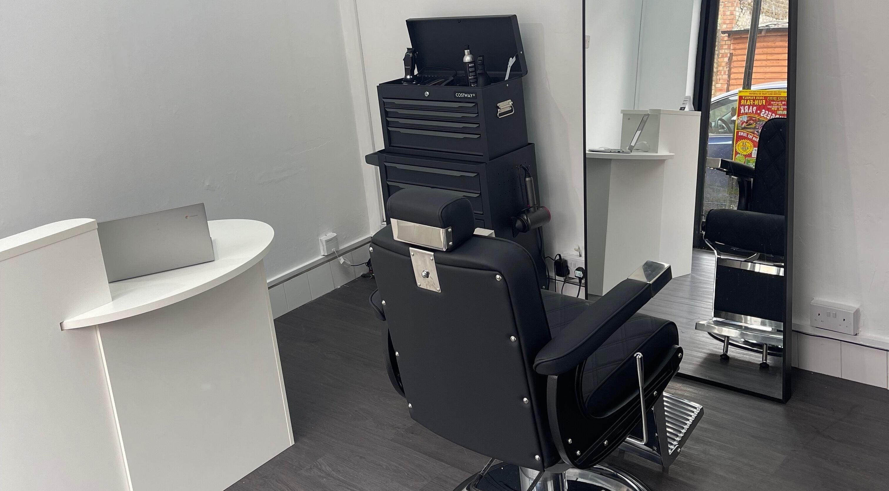 Sleek barber chair and tools at Alexandre Cuts, London, England, GB.