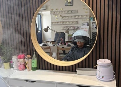 Elegant salon setup with client pampering at Shriji Beauty touch, Huddersfield, England, GB.