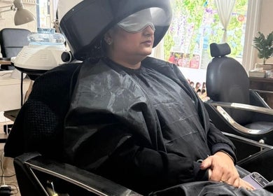 Customer enjoying hair treatment at Shriji Beauty touch, Huddersfield, England, GB.