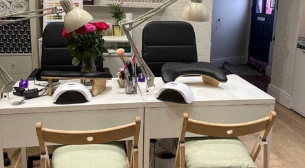 Sophisticated nail station at Shriji Beauty Touch, Huddersfield, England, GB, featuring modern decor.