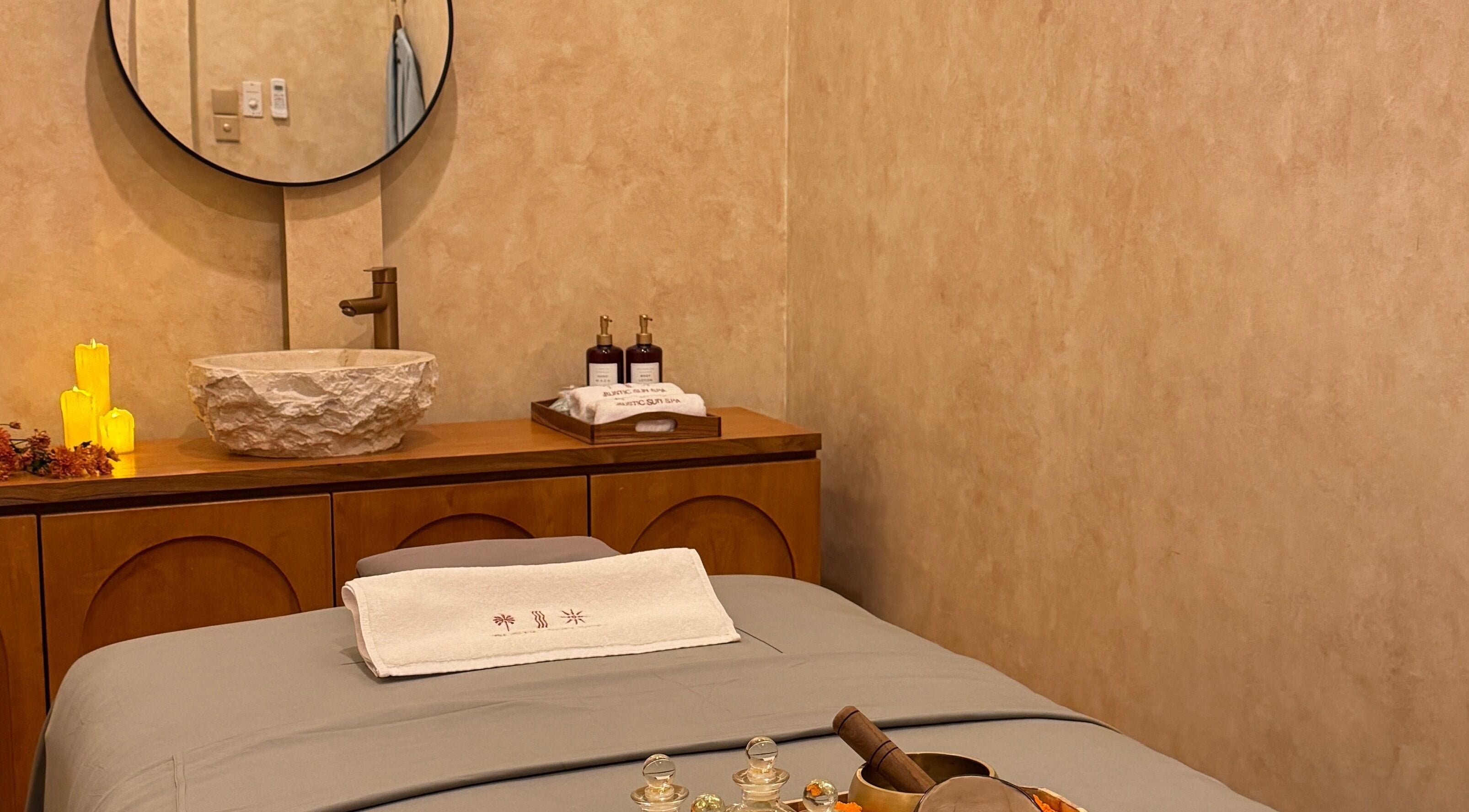 Relaxing spa room at The Rustic Sun Spa - Berawa with cozy decor and massage table, Bali, Bali, ID.