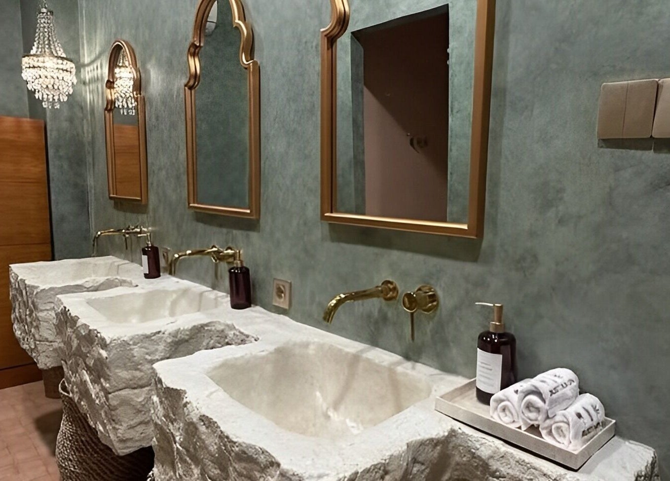 Luxurious stone vanity with gold accents at The Rustic Sun Spa - Berawa, Bali, Bali, ID.