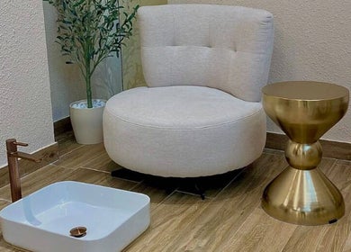 Luxurious pedicure corner at Alma Beauty Salon in Lusail, Al Daayen Municipality, QA with elegant seating.