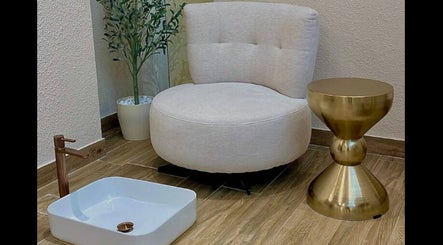 Luxurious pedicure corner at Alma Beauty Salon in Lusail, Al Daayen Municipality, QA with elegant seating.