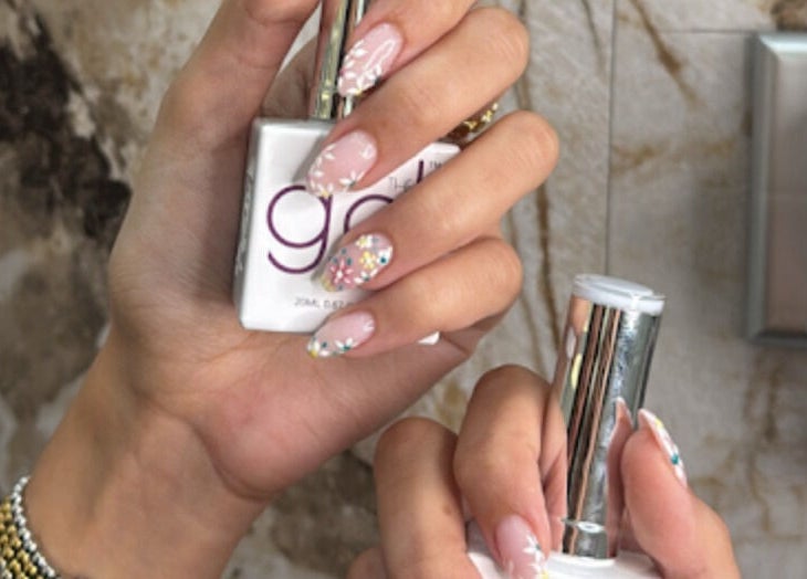 Floral nail art design at Me Salon, Riyadh, Riyadh Province, SA showcasing gel polish and creativity.