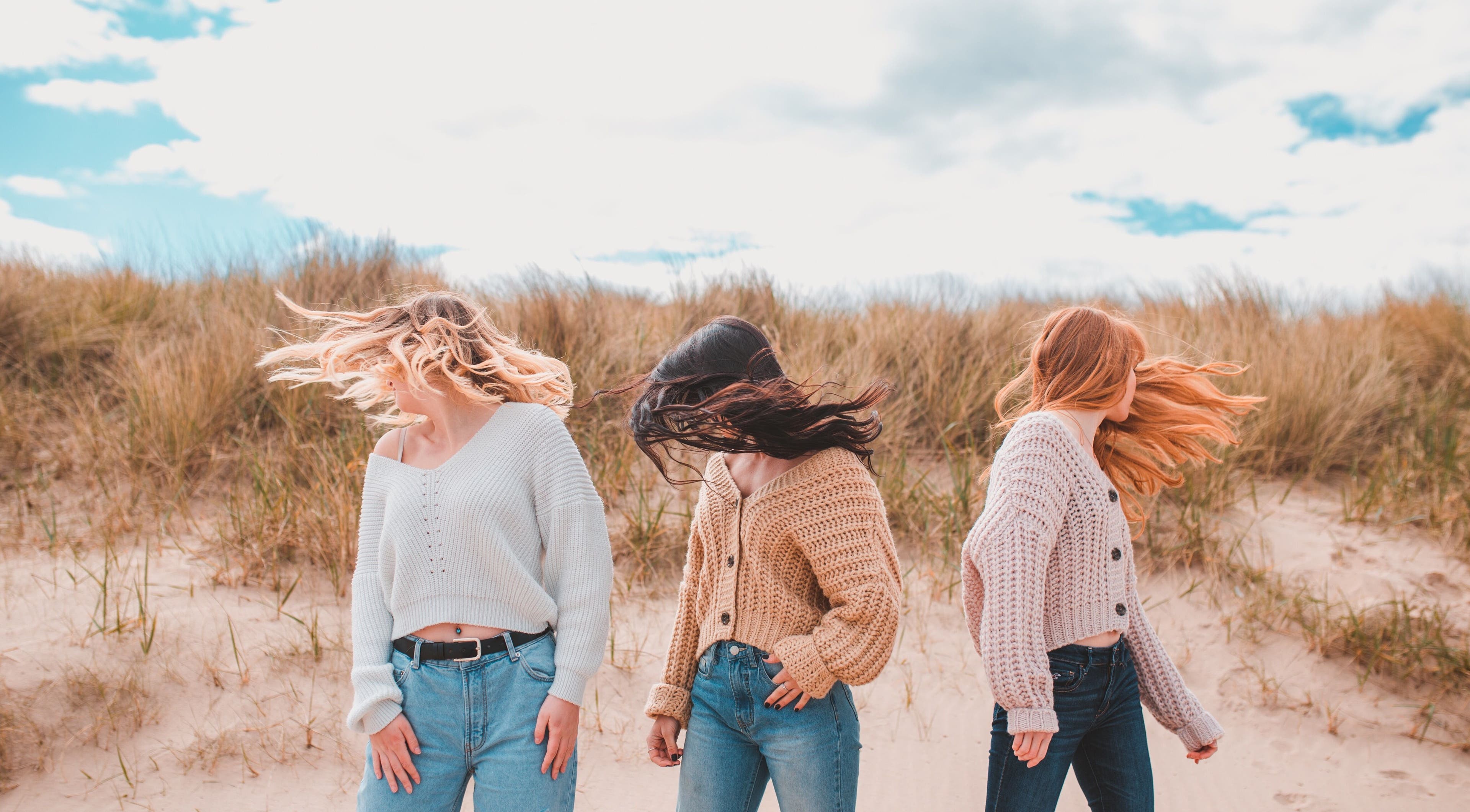 Stylish hair flows in the beach breeze at Emma Combe Hair, North Berwick, Scotland, GB.