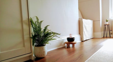 Cozy corner with lush plants at Little Mamma Wellness, Bowburn, England, GB.