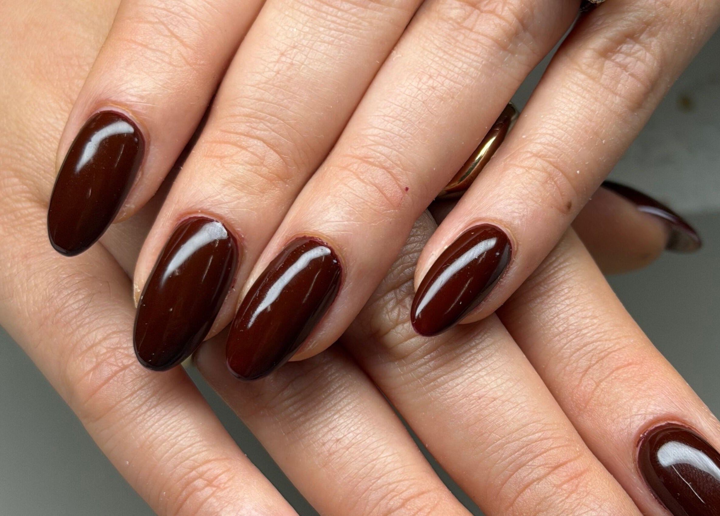 Rich mahogany nails at Aura オーラ Nails & Spa, Yokosuka, Kanagawa, JP. Ideal for chic, polished looks.