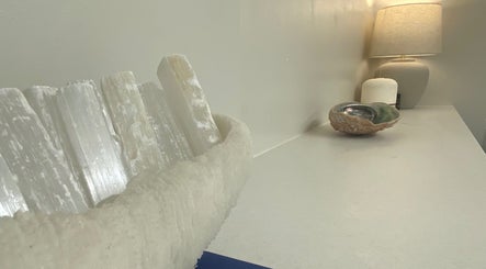Elegant treatment room at Beauty by Ella, Derby, England, GB with soft lighting and natural decor.