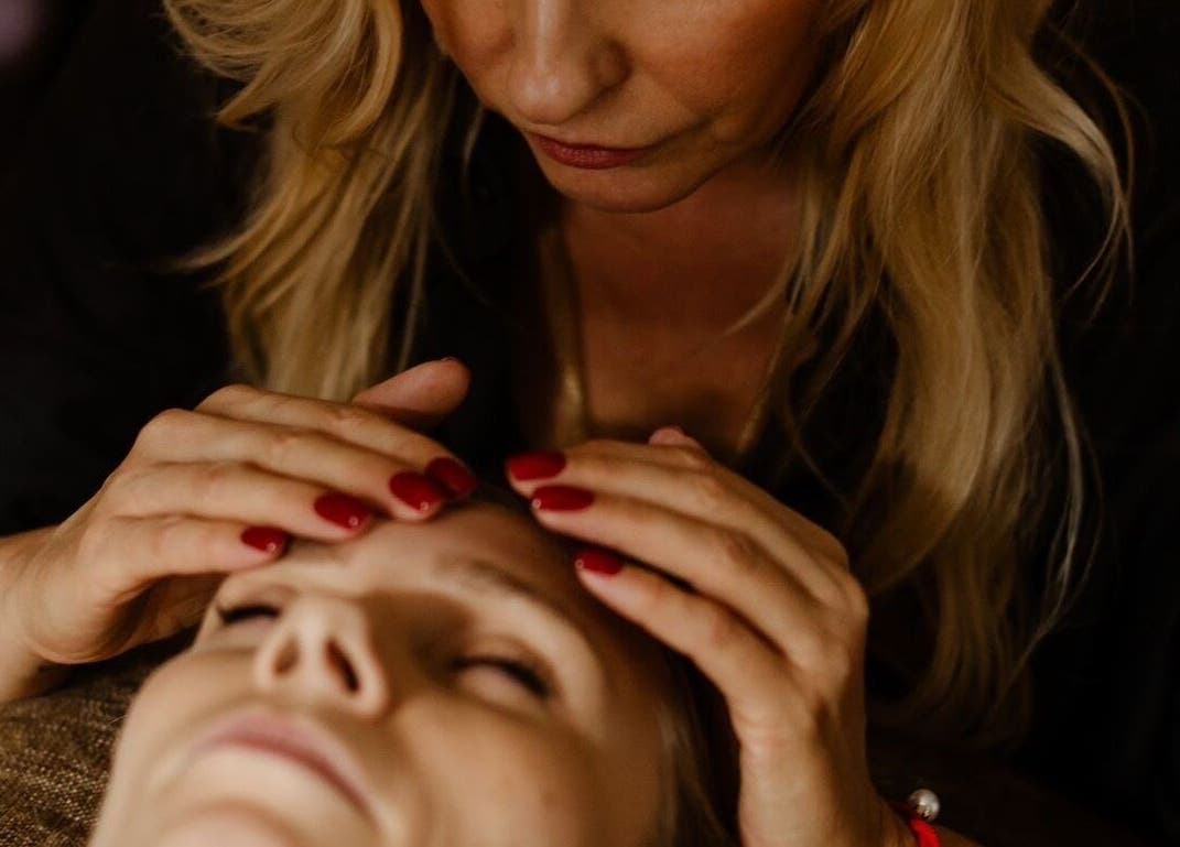 Relaxing therapy session at Energoterapija in Rīga, LV with gentle facial massage.