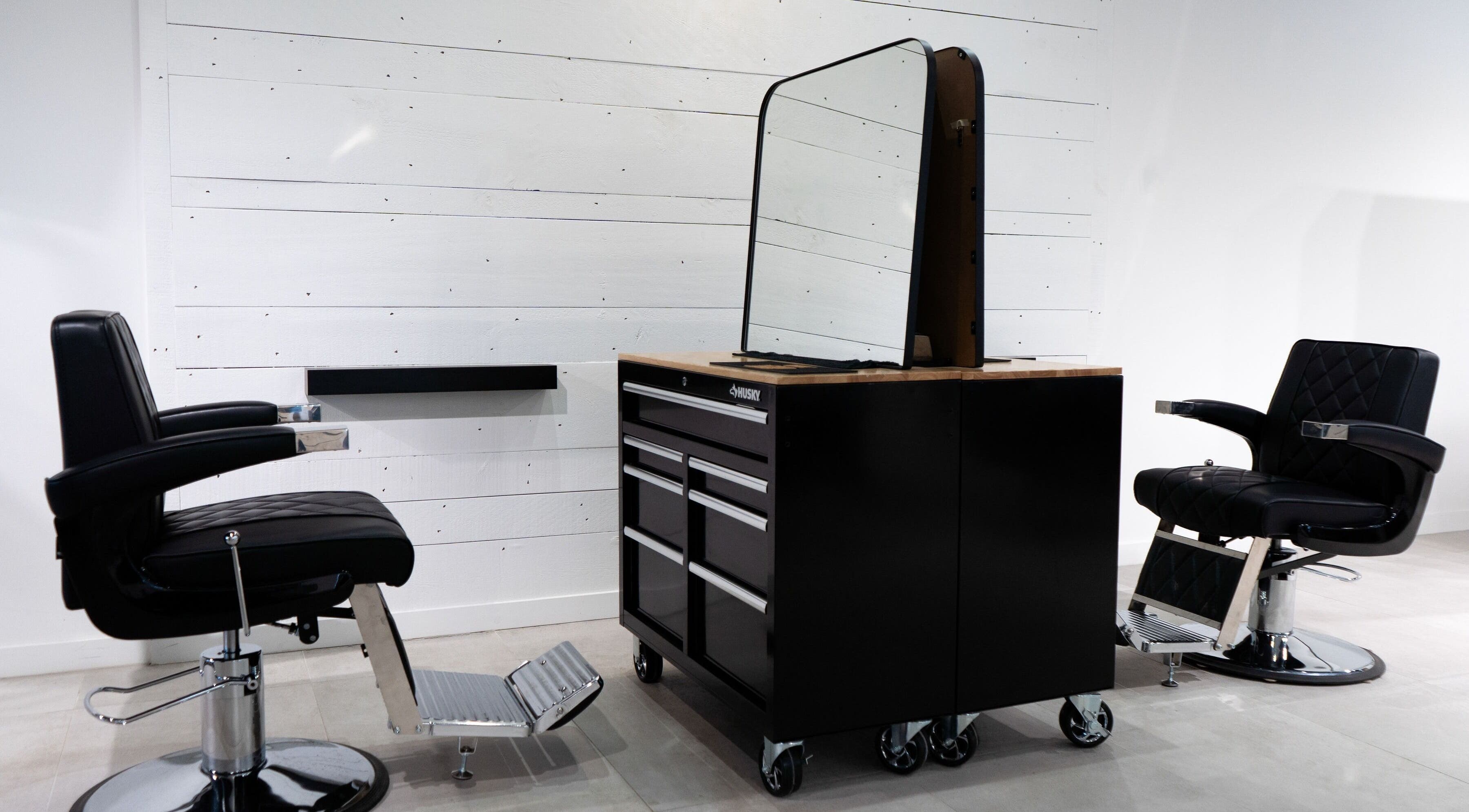 Stylish hairdressing chairs and mirror at Le Salon Sugar (Rosemère), Rosemère, Québec, CA.