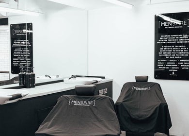 Modern interior of Menspire St Albans with stylish barber chairs in St Albans, England, GB.