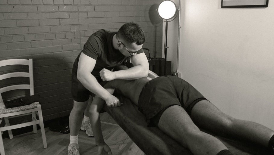 Massage therapist working on a client at A Fitness - Health and Wellness Clinic in London, England, GB.