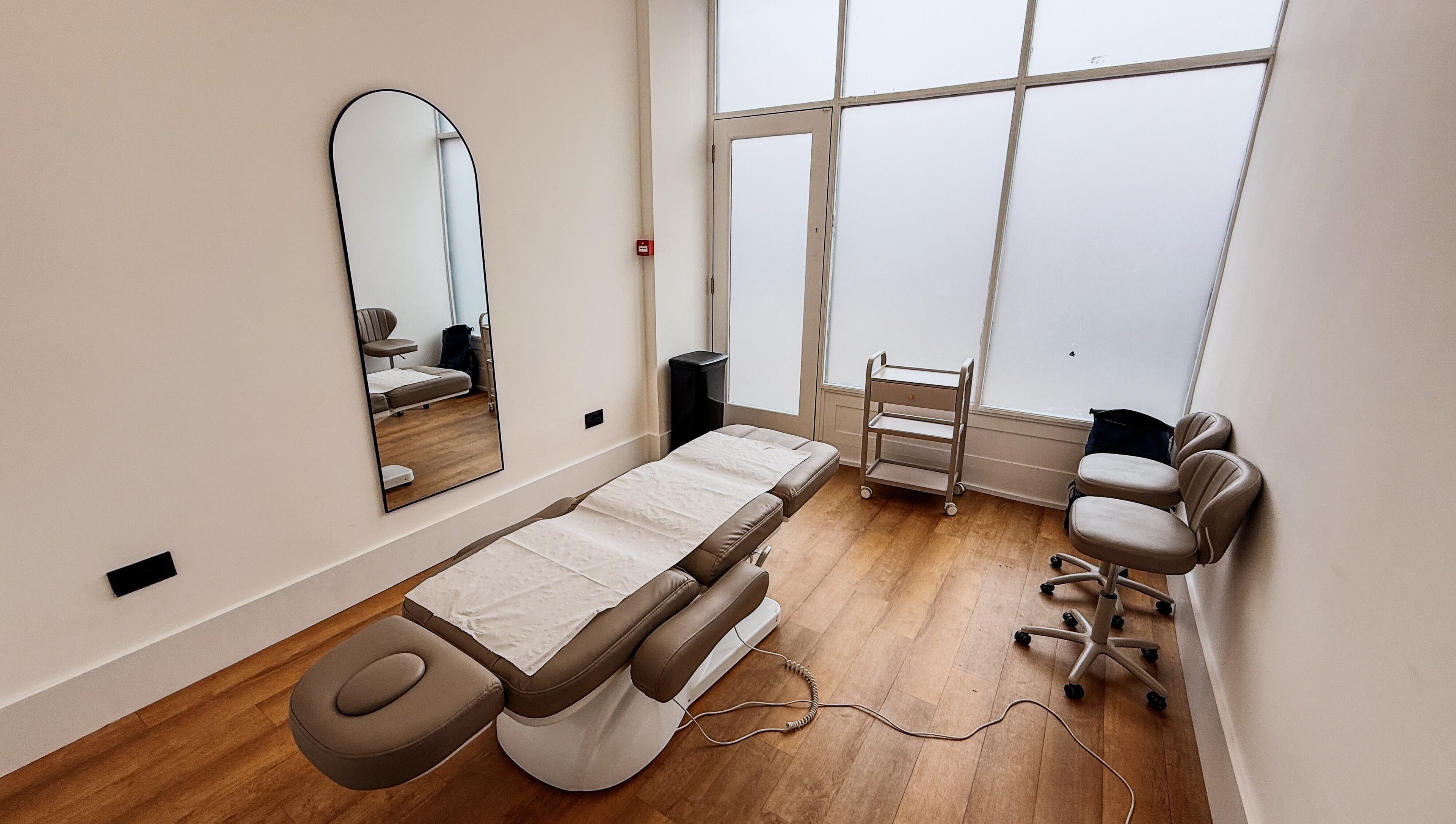 Therapy room with treatment bed at A Fitness - Physical Therapy Clinic, London, England, GB.