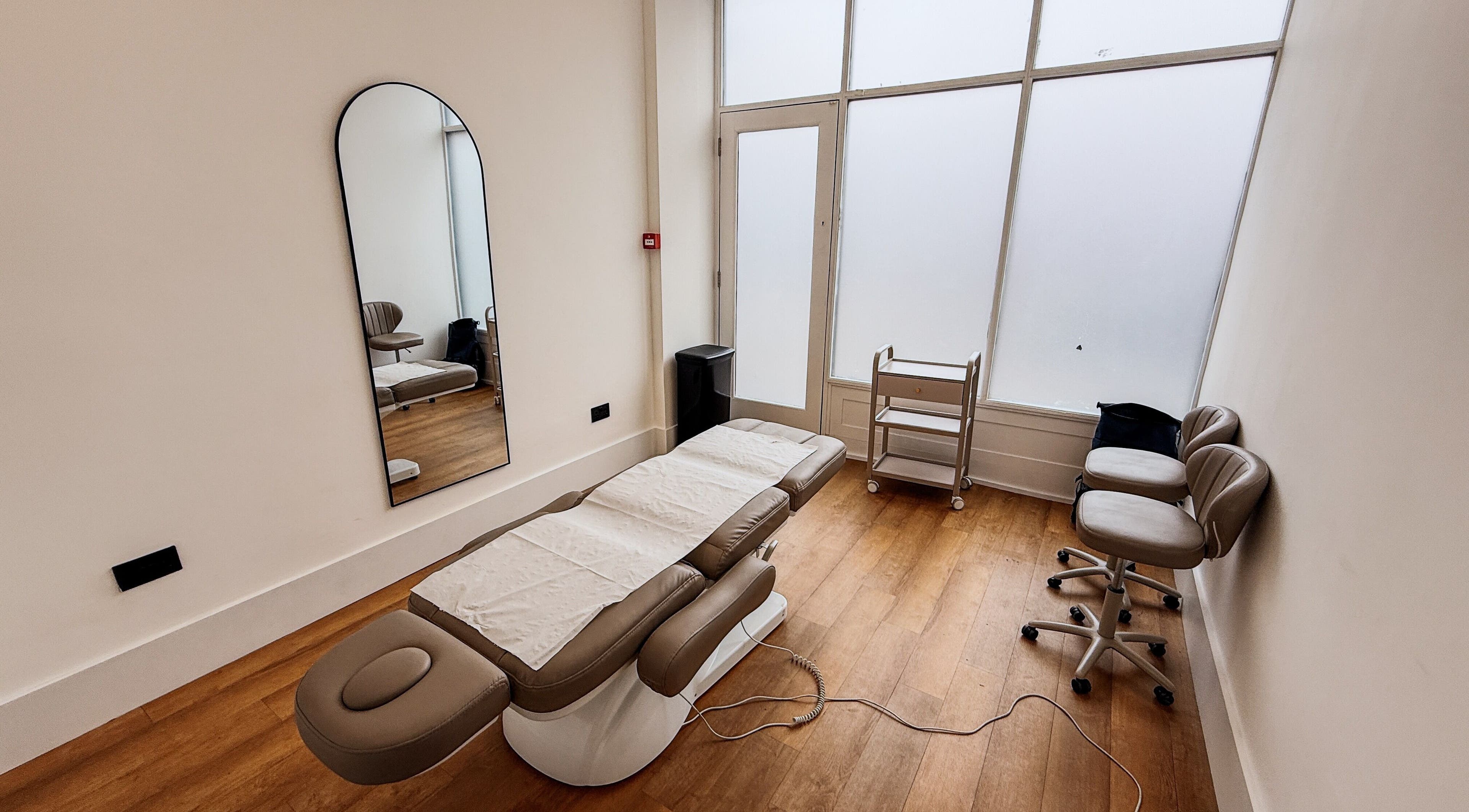 Therapy room with treatment bed at A Fitness - Physical Therapy Clinic, London, England, GB.
