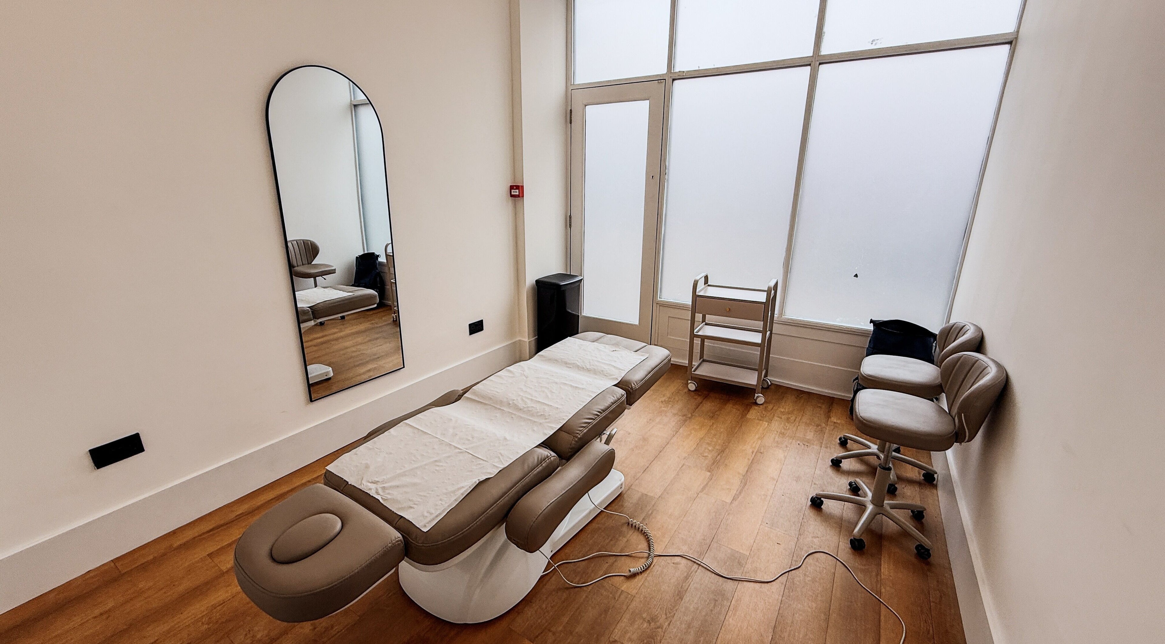 Therapy room with treatment bed at A Fitness - Physical Therapy Clinic, London, England, GB.