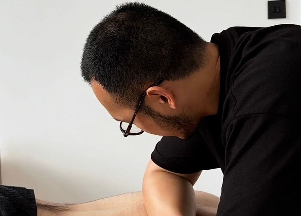 Therapist providing treatment at A Fitness - Physical Therapy Clinic in London, England, GB.