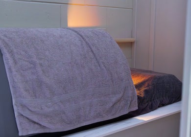 A relaxing treatment room with warm lighting at Solais, Stirling, Scotland, GB.