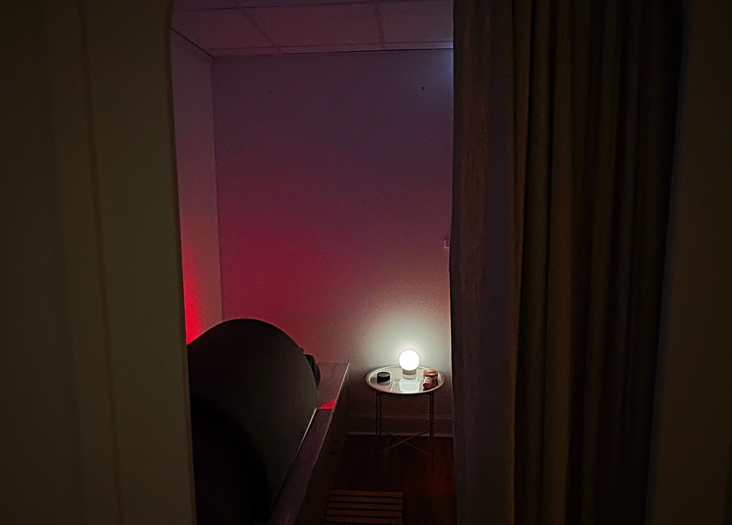 Relaxing dimly-lit therapy room at Solais Wellness, Dunblane, Scotland, GB featuring calm ambiance.