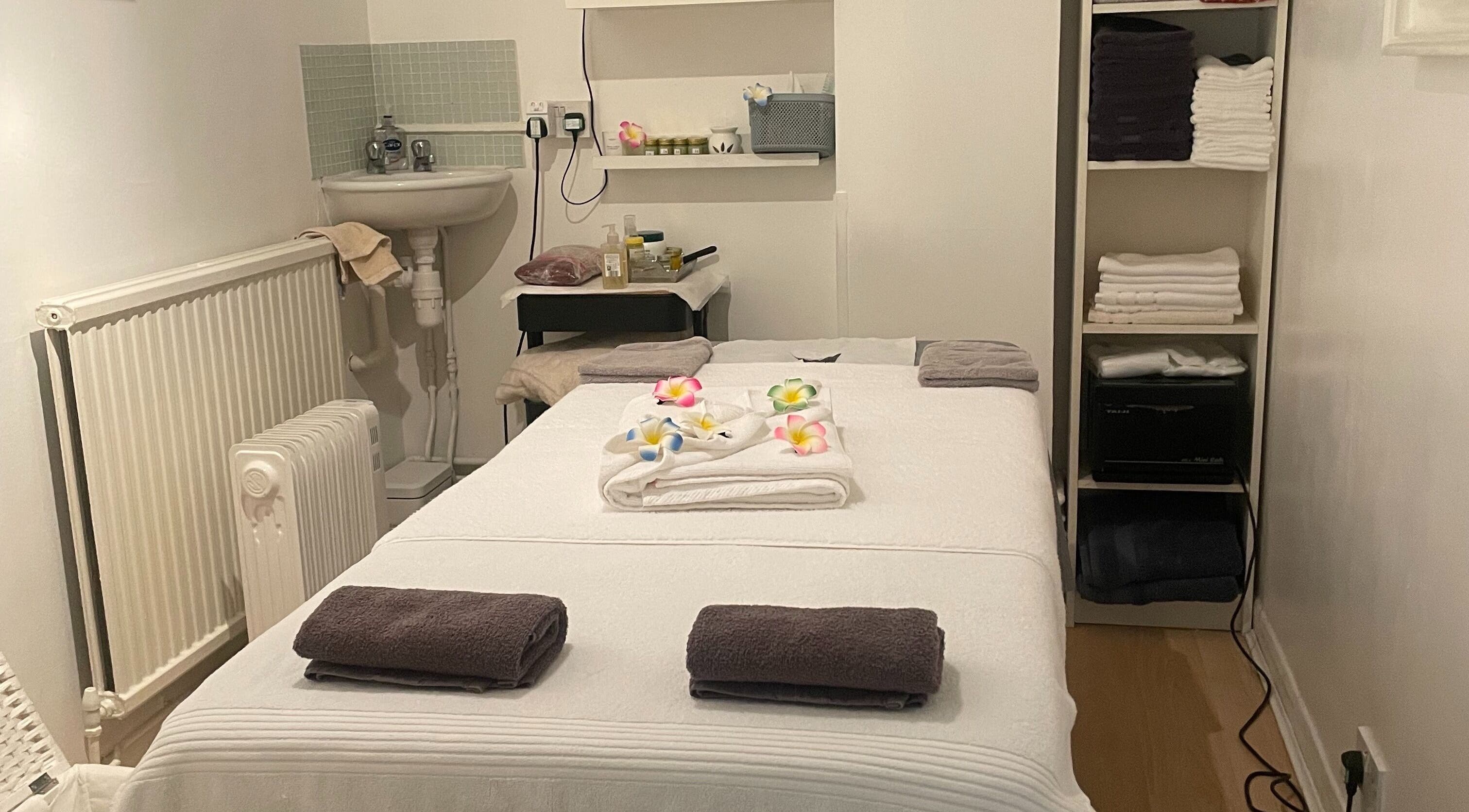 Relaxing massage room at Plumjai Thai Massage And Wellness, Saffron Walden, England, GB, with calming decor.