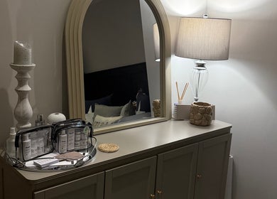 Elegant vanity with mirror and skincare at SKinGlow.Co, Ripon, England, GB.