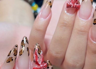 Leopard print nail art at Woo Salon Studio, Arcadia, California, US. Striking and trendy designs.