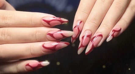 Elegant red and nude nail art at Woo Salon Studio, Arcadia, California, US.