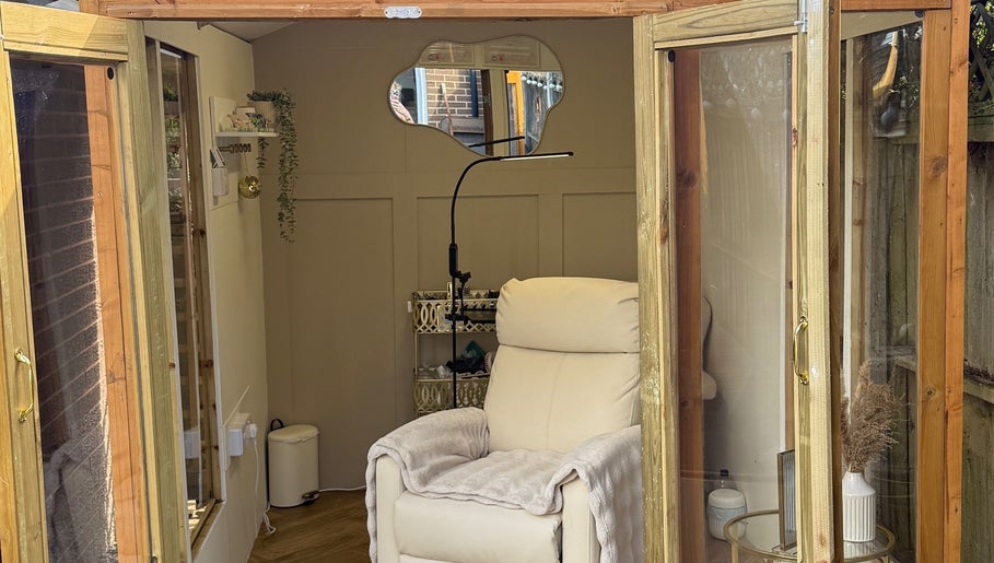 Elegant interior of Sophabulous - Lashes by Soph, Leeds, England, GB with plush chair and chic decor.