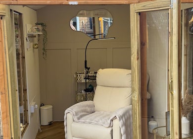 Elegant interior of Sophabulous - Lashes by Soph, Leeds, England, GB with plush chair and chic decor.