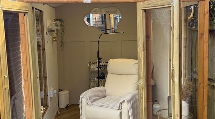 Elegant interior of Sophabulous - Lashes by Soph, Leeds, England, GB with plush chair and chic decor.