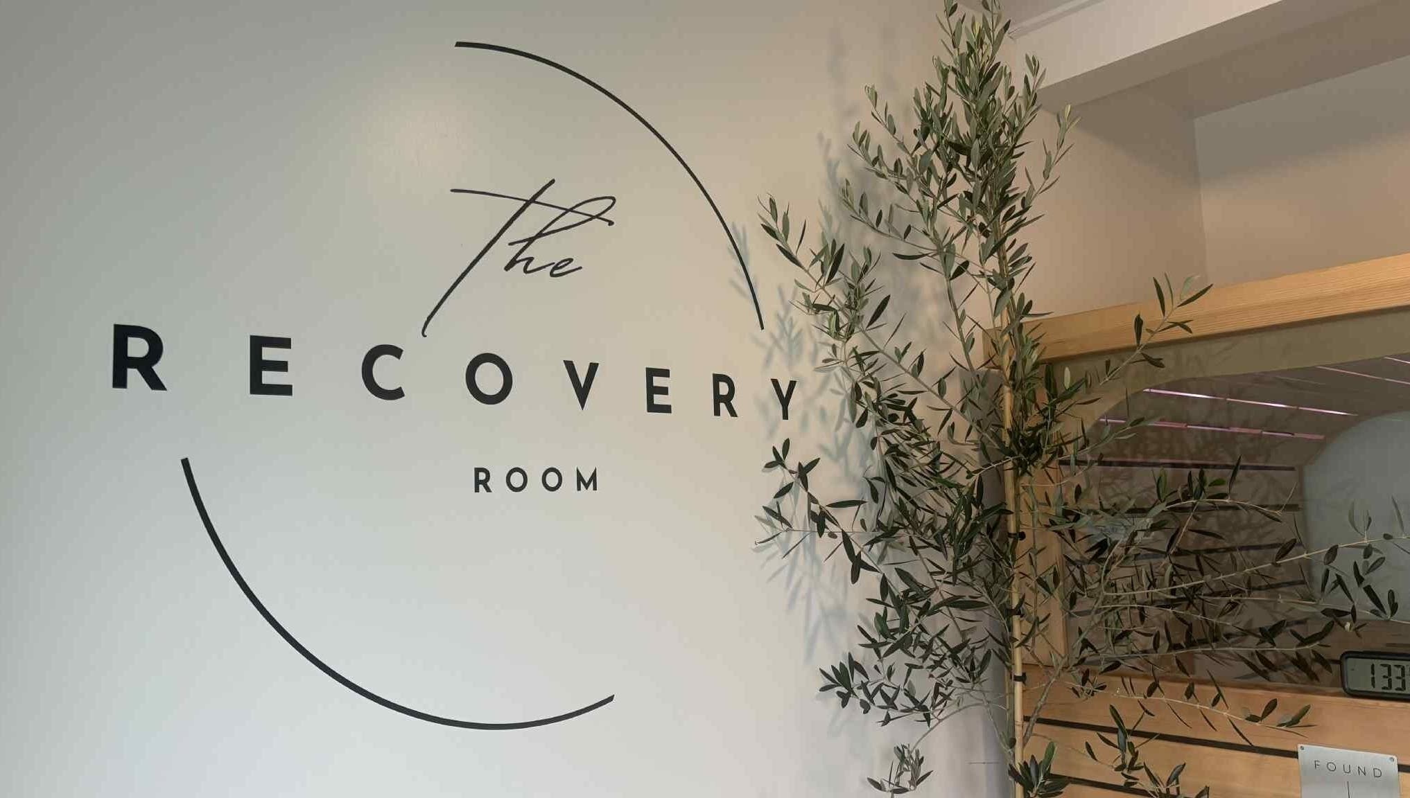 Entrance of The Recovery Room in Taupō, Waikato Region, NZ with soothing olive decor.