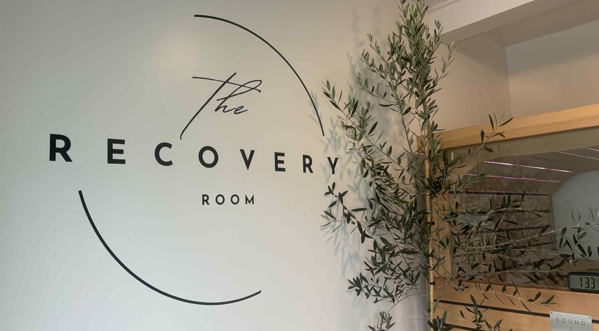 Entrance of The Recovery Room in Taupō, Waikato Region, NZ with soothing olive decor.