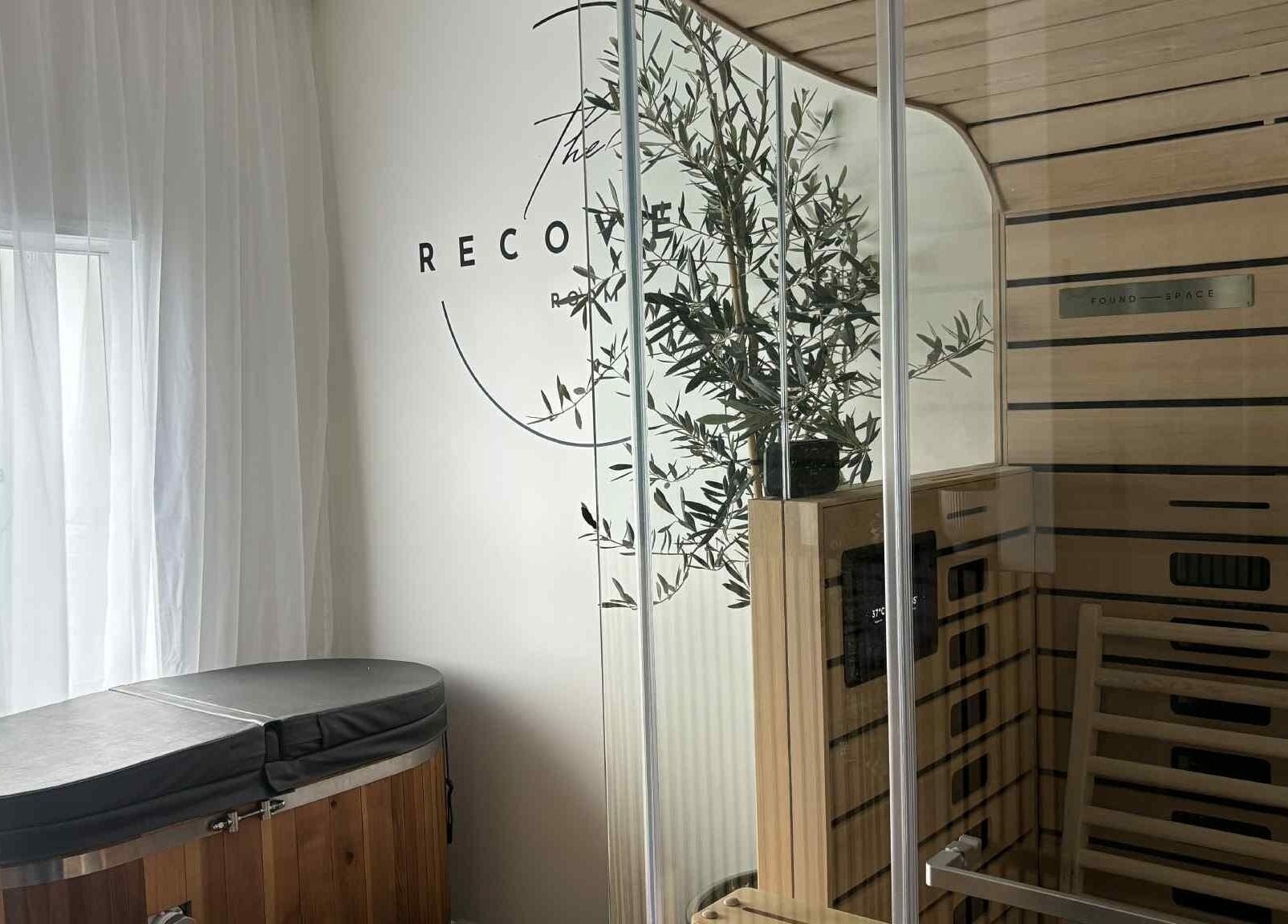 A tranquil sauna and spa room at The Recovery Room, Taupō, Waikato Region, NZ, featuring soothing decor.