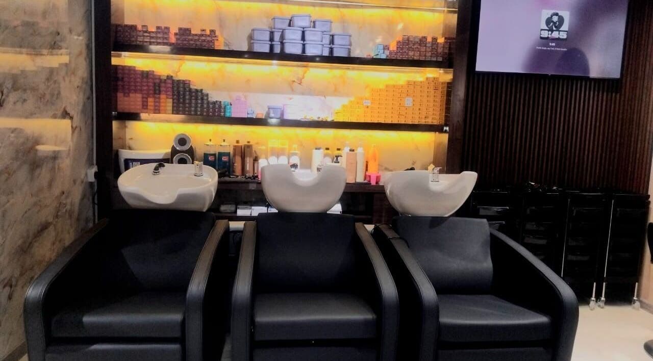 Elegant wash stations at Hair Talkz Mercure Gold Hotel, Dubai, Dubai, AE, offering premium hair care experience.