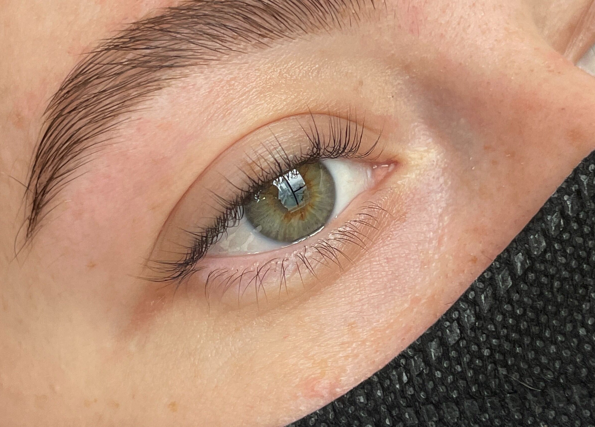 Close-up of perfectly shaped eyebrows, expertly groomed at BrowGal, Hà Nội, Hà Nội, VN.