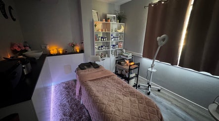Cozy treatment room at Moonlight Beauty, Rosyth, Scotland, GB with ambient lighting and soothing decor.