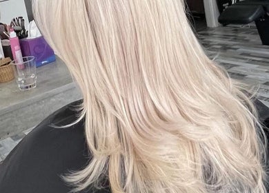 Stylish blonde hair at Bouma hair boutique, Nicosia, Lefkosia, CY showcasing modern salon decor.
