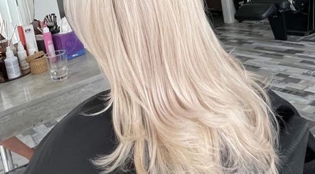 Stylish blonde hair at Bouma hair boutique, Nicosia, Lefkosia, CY showcasing modern salon decor.