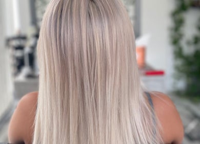 Silky blonde hair transformation at Bouma hair boutique, Nicosia, Lefkosia, CY showcasing professional style.
