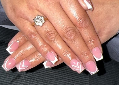 Close-up of elegant pink and white heart nails at Bee’s Beauty, Coventry, England, GB.