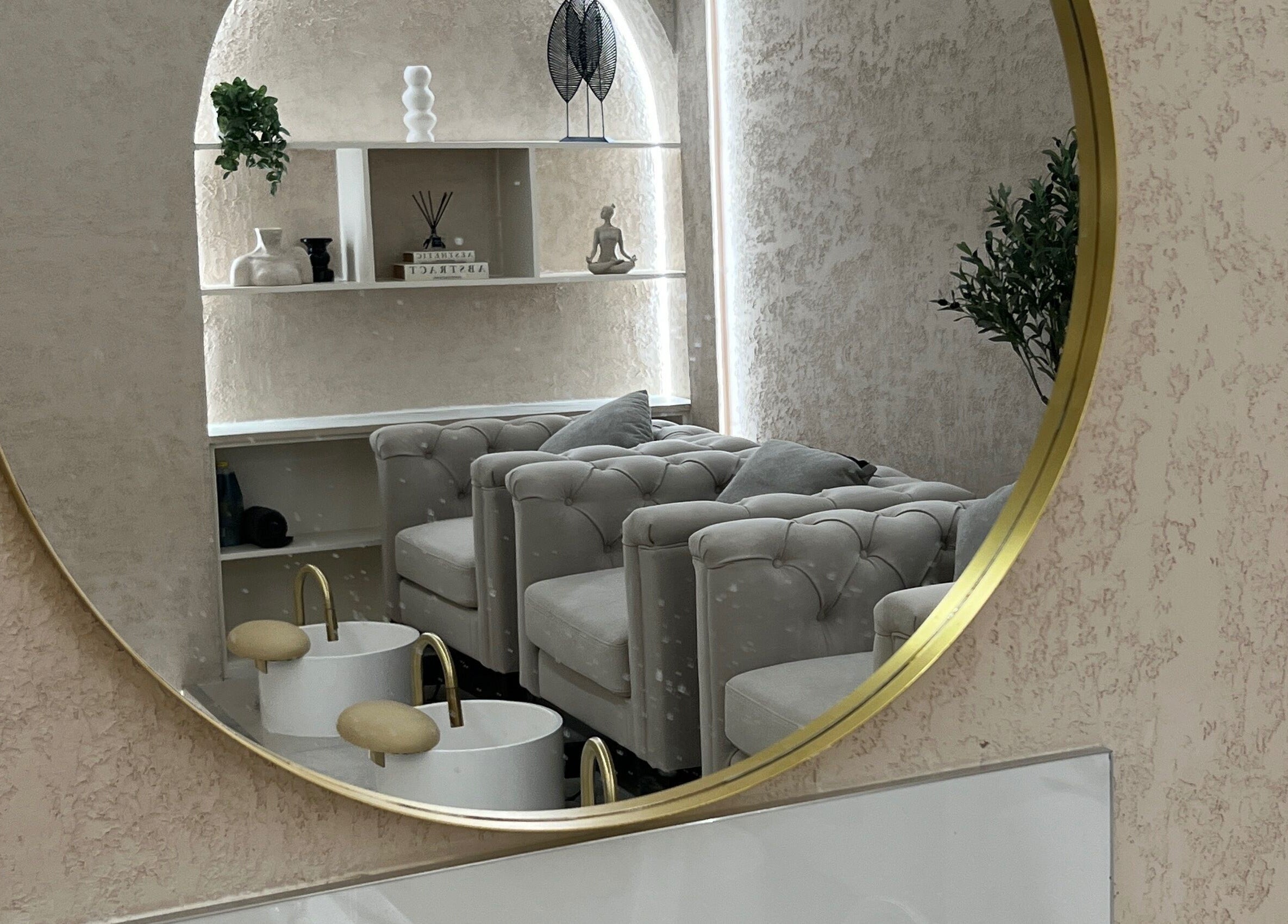 Elegant mirror reflecting plush chairs at Amore Beam Park, Rainham, England, GB calm ambiance.
