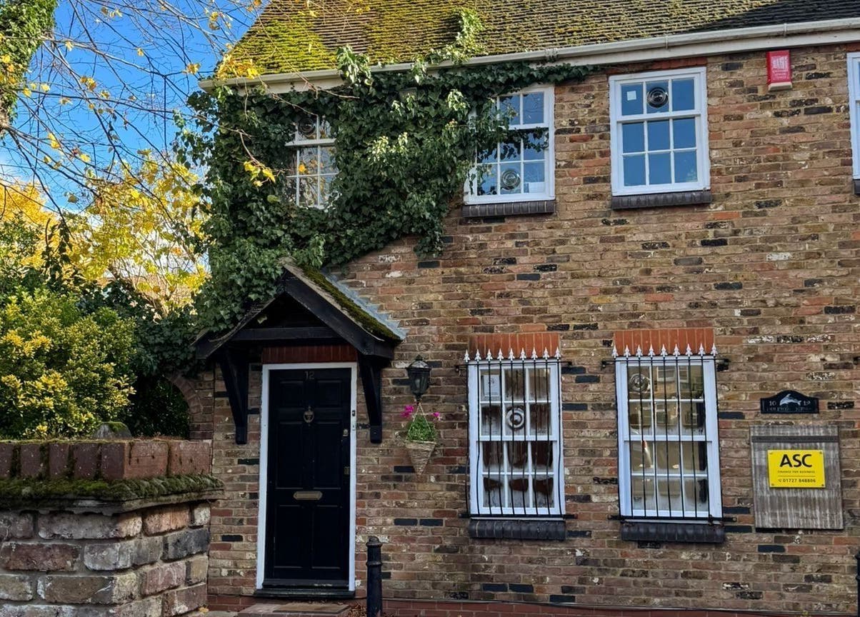 Front view of Louise Knight Beauty, a charming brick building in St Albans, England, GB.