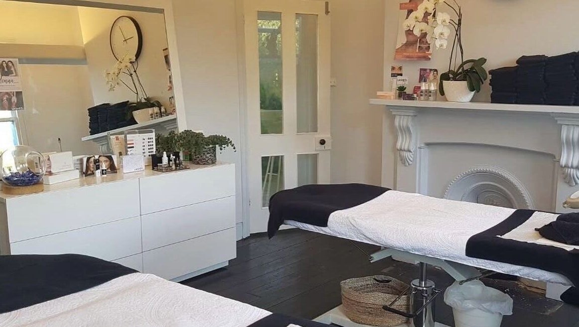 Elegant treatment room at LASHED EYELASH EXTENSIONS Albert Park, Victoria, AU with beds and calming decor.