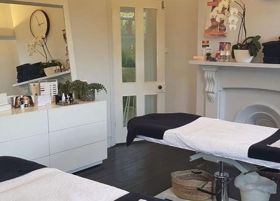 Elegant treatment room at LASHED EYELASH EXTENSIONS Albert Park, Victoria, AU with beds and calming decor.
